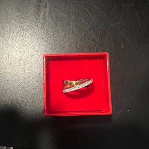 18 k gold and platinum crossover ring.